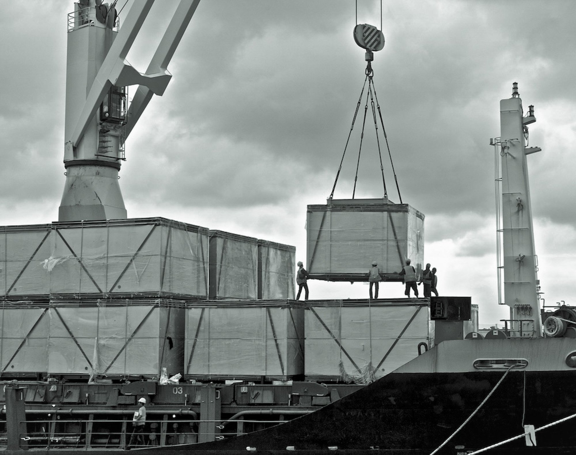 loading-cargo-into-the-ship-in-port-shipyard-2024-09-19-01-26-46-utc-1